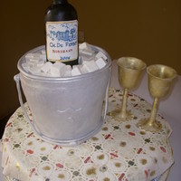 Wine Bottle Cake I made this cake for the launching of the wine - Chateau De Ferboy. The sugar ice cubes i made melted so i had to make do with cubes made...