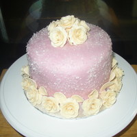 Bride And Groom Cake White cake with bc crumb coat, mauve fondant, ivory roses, white sparkling coarse sugar