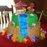 1St Time Birthday Cake It was a Luau party for my daughter's 1st birthday. I did a 2 tier cake...bottom tier was yellow cake with whipped frosting and...