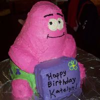 002.jpg This was a cake i made for a friends little girl. I used 2 10 inch, 1 8inch, and 2 6 inch, it was a pretty big cake, b/c was used to cover...