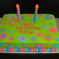 Addye's 2Nd Birthday 11 X 15 sheet cake in butter cream with fondant flowers, balls and candles.