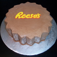 Reese's Groom Cake Groom Cake for the Reese's, so the idea really fit. 12 inch round with chocolate butter cream icing and fondant Reese's logo....