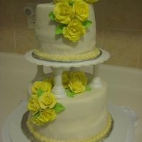 Wilton Course Tiered Cake Wilton course cake. Used a crock pot stoneware for the top layers as I didn't have a small pan. Could have been more careful to make...