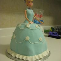 Doll Dress Cake For my girlfriend's coworker's daughter. She supplied the doll and I used a large mixing bowl to bake the cake in. It may have...