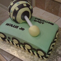 Baby Rattle Baby rattle cake for a themed baby rattle baby shower. ball is cake covered in fondant and 9x13 is cake with BC and fondant accents.