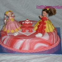 Dolls At The Celebration Vanilla cake, strawberry cream, strawberries, fondant