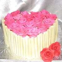 White Choc Cigarettes Heart Cake Choc fudge cake with raspberry buttercream filling , iced with white choc buttercream,then outlined with white choc cigarettes ( first time...