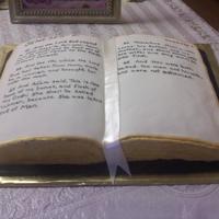 Bible 2 mix book pan, all buttercreme except top pages are fondant, used fork to get page effect on side and lots lots of gold lustre. someone...