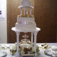 50 Th Wedding Renewal my first wedding cake for mom and dads 50 ann. (renewed vows) all buttercreame, buttercreme roses spray painted with pearl / gold lustre...