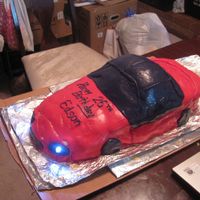 '99 Camaro Cake- Very First Cake Ever I used buttercream icing using a recipe from cake central...delicious... and I used homemade marshmallow fondant. I have taken no cake...