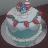 Snowman Christmas Cake For my husband to take to work. Vanilla cake with vanilla butter cream. Covered in fondant with fondant decorations.