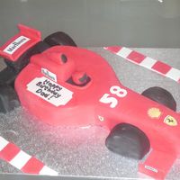 Formula 1 Car Vanilla cake with buttercream and covered in fondant.