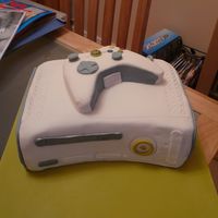 Xbox 360 Cake I made this for my 15 year old nephew. Its ginger cake with ginger and lemon buttercream covered in fondant. Thought it would be easy. it...