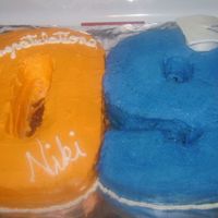 Class Of '09 The "0" is a classic yellow cake with buttercream filling and orange buttercream frosting. The "9" is a dark chocolate...