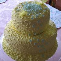 Butterfly Cake Layers of Pink Champagne and Pound Cake with a Raspberry White Chocolate Mousse filling and Buttercream frosting, topped with Fondant. Blue...
