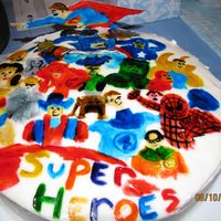 Here Come The Super Heroes!!! I placed a thin layer of gumpaste over a round ten inch cake. I then painted all of my favorite super heroes onto the cake. I also carved...