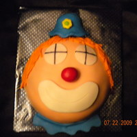 Clown Smash Cake A smash clown cake for a boy's 1st bday party to go along with a popcorn box cake. The cake was marble with raspberry chocolate...
