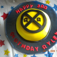 Rail Road Crossing Smash Cake Not only does my son LOVE trains, but, he loves 'train signs!" So, I decided to make his smash cake just that to go along with...