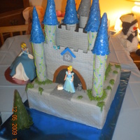 Cinderella's Castle Cake This cake was made for a Princess who turned one. I also had Jello to put around the bottom as water, wooden stairway covered in fondant...