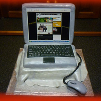 Laptop On Table With Mouse Made this for my hubby recently, to take to work, as they are all in IT. It was a huge hit with everyone! My first attempt at something...