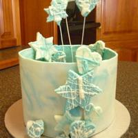 White Chocolate Marble Collar With Stars And Hearts Made this for my birthday the other day, having just completed a short course on decorating cakes with chocolate.