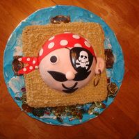 Katie's Pirate I got the idea for this one off the internet somewhere. the patch is plastic as well as the decor on the board.