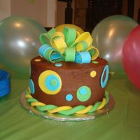 Brown Blue And Yellow My little sister picked this cake for her birthday from CC's lecrn. I changed very little but she loved it! Thanks for the creativity...