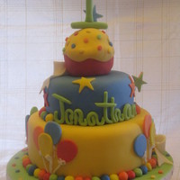 First Birthday Cake This cake was for a little boys first birthday. The parents found a picture they liked and this was my version of it. I think it turned out...