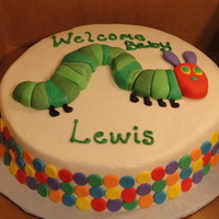Very Hungry Caterpillar Buttercream Icing and Fondant Caterpillar. Caterpillar took me a while and especially the dots on the side. But I was very pleased when...