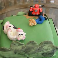 Quad Bike Birthday Cake Birthday cake for farmers son with new red quad bike for cow herding! Vanilla sponge with strawberry jam fondant covered.