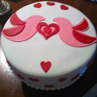 Valentine's Day Cake Yellow cake with dark chocolate filling covered in fondant. I made this for the team I manage at work as a Valentine's Day surprise.