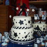 Elvis Lives!!! Cake was done for a 40th birthday party. All buttercream with fondant accents. Small cake on right was chocolate with a white chocolate...