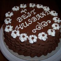 Best Husband (6Th Cake) Chocolate cake, chocolate buttercream icing, fudge filling.