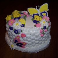 Wilton Course 2 Grand Finale Cake (5Th Cake) Yellow cake, strawberry filling, buttercream icing with royal icing flowers and color flow butterflies.