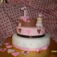 1St Birthday Cake This is is my Baby Girls 1st birthday cake. Everything thing is fondant except for the ribbon.