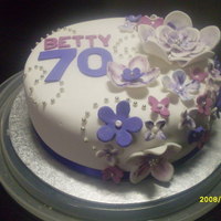 70Th Birthday Cake My first 'floral'cake. My auntie saw a coffee cup design she liked so this is based on that