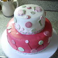 Raspberry Swirl Baby Shower Bottom Tier is butter yellow with bavarian cream, bananas & strawberries. Top Tier is chocolate with cookies & cream buttercream....