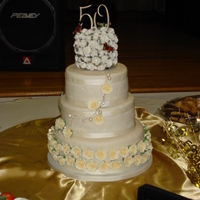 Happy 50Th Anniversary to my Aunt & Uncle. Topper is silk flowers as my Aunt wanted a keepsake :)