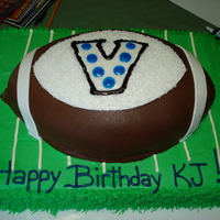 Villanova Football 21St Birthday Field is Lemon cake with lemon buttercream, Football is lemon cake with dark chocolate fondant with fondant decoration. Logo on football is...