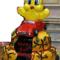 Tweety Bird Cake This is more of a little kids cake, but it was made for a 60 year old who has this obsession with tweety and cars. Made with fondent and my...