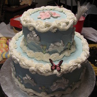 Hopping Bunnies Cake I made this cake for a co-worker for a kids Easter egg hunt. She wanted something cute with bunnies. Everything on this cake is edible