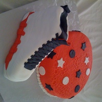 Air Jordan This is my first carved cake. My rendition of Air Jordan shoes. Made with pound cake. Covered in fondant.