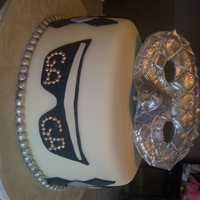 Lady Gaga Cake was made for my daughter's friend who loves Lady Gaga. Cake was white cake with raspberry filling. The mask was done in fondant...