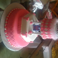 Princess This cake is white cake with strawberry filling. All accents are fondant. The crown is a party favor.