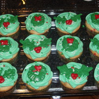 Simple Christmas Cupcakes Made some simple Christmas cupcakes to take to a potluck at work. Decorations on top are candy melts.