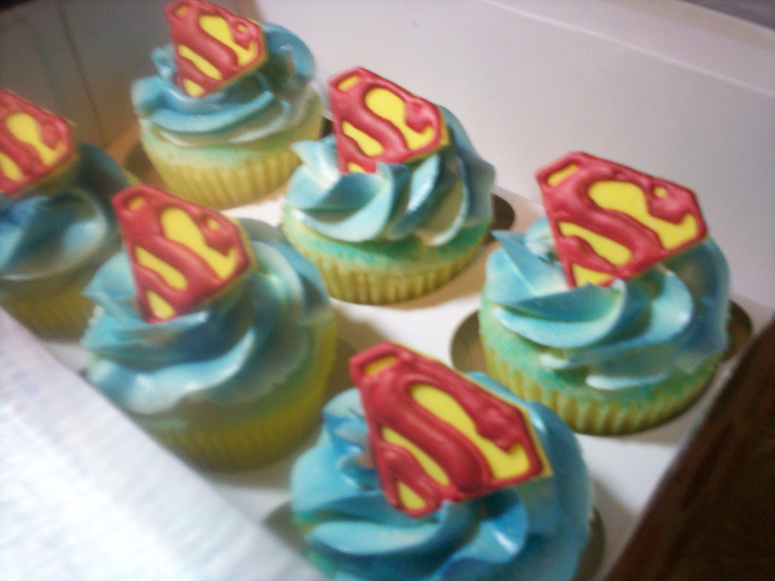 Superman Cupcakes Vanilla cupcakes with vanilla buttercream. I made the logos out of royal icing and fondant. Fun to make and hopefully the birthday boy will...