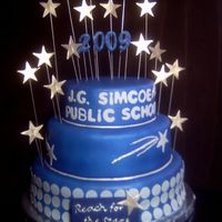 Blue And Silver Grad Cake The first real tiered cake I've done. It's for a grade 6 graduation/farewell. The bottom tier is MESSED up... I've got a...