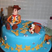 Toy Story Cake figures all made with fondant and modeling paste, slinkys spring made with florist wire.