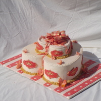 Hearts And Butterflies all cover cake is fondant and the bow is gumpaste and butterflies