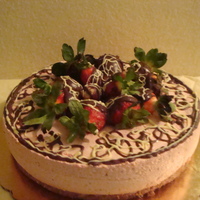 Strawberry Mousse and the top fresh strawberries with dark chocolate and white chocolate